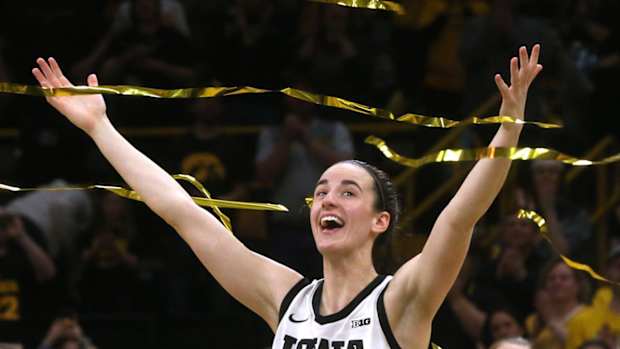 Caitlin Clark celebrates during Iowa’s senior night.